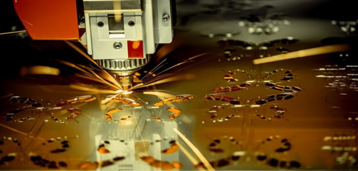 CNC-laser-cutting-machine-cutting-designs-into-metal-sheet